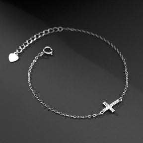 Pulseira Feminina Aurora Cross – Pingente Delicado de Cruz Banhada em Ouro [COMPRE 1 LEVE 2]